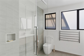 contemporary bathroom renovation white and wood aesthetic 1