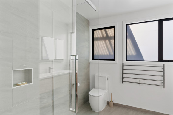 contemporary bathroom renovation white and wood aesthetic 1