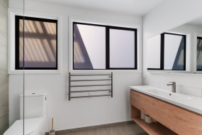 contemporary bathroom renovation white and wood aesthetic 3