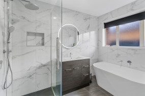 modern bathroom renovation sleek faucet marble tile 2