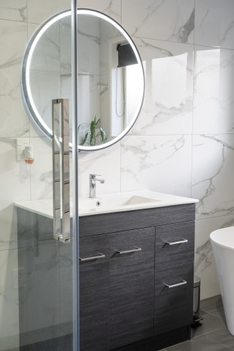 modern bathroom renovation sleek faucet marble tile 3