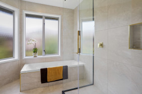 spa inspired bathroom upgrade marble surfaces gold details 1