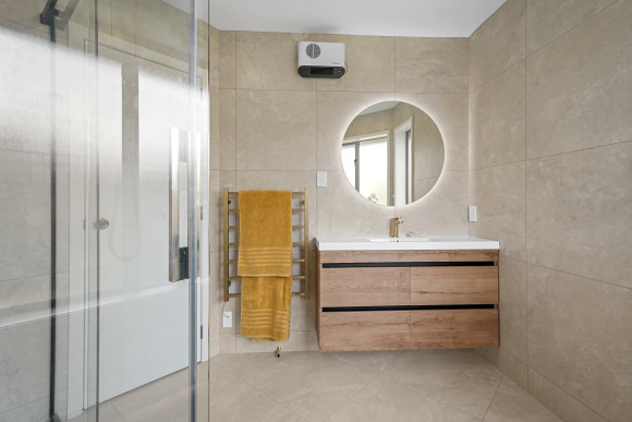 spa inspired bathroom upgrade marble surfaces gold details 6
